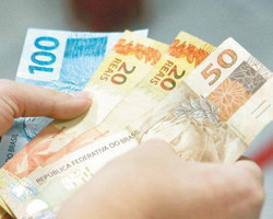 Valor do salário mínimo pode subir em 2022 para R$ 1.155,55, diz SPE