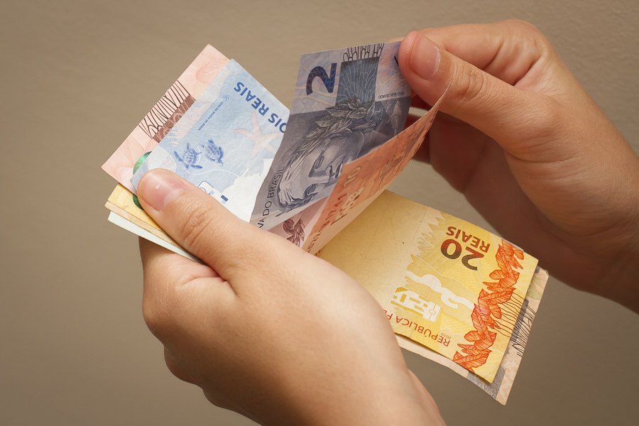 Novo mínimo deverá passar de R$ 1.100 para R$ 1.177. Mas, ainda estará longe do ganho real. (Foto: Reprodução)